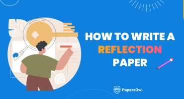 Person writing a reflection paper with pen and paper