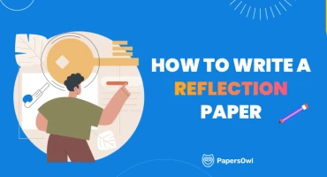 Person writing a reflection paper with pen and paper