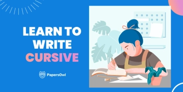 A person learning to write in cursive at a desk with plants and writing materials, showcasing a focus on handwriting skills.