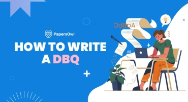 Student working on a DBQ essay with papers and computer