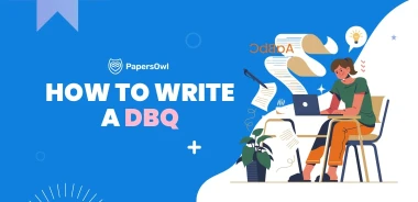 Student working on a DBQ essay with papers and computer